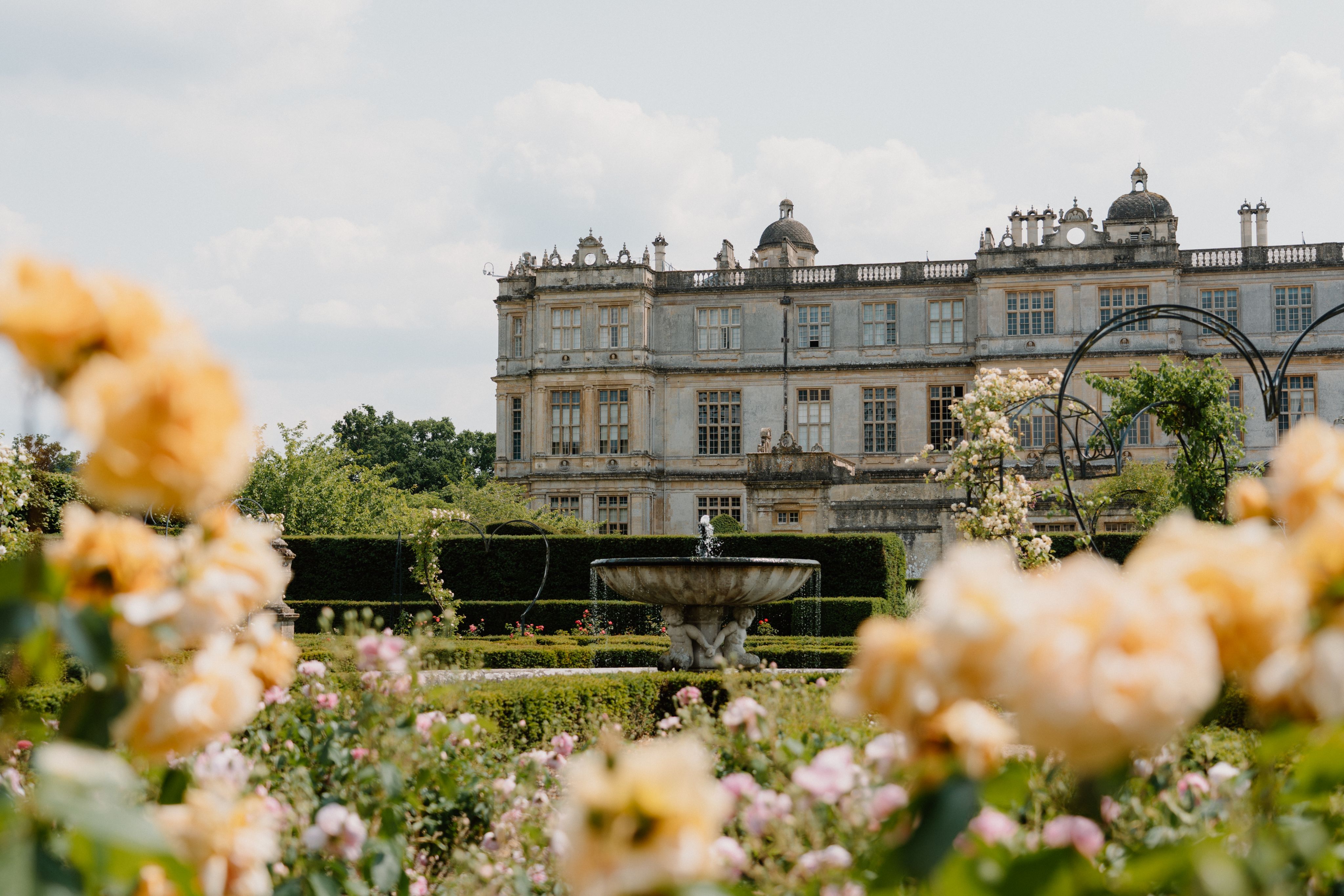 The rose garden at Longleat. Longleat House in the background.