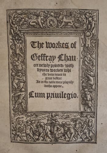 Image of a title page with a woodcut boarder featuring putti.
